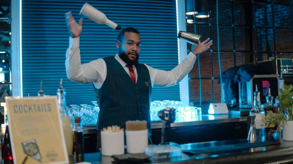 Bartender showcasing cocktail skills