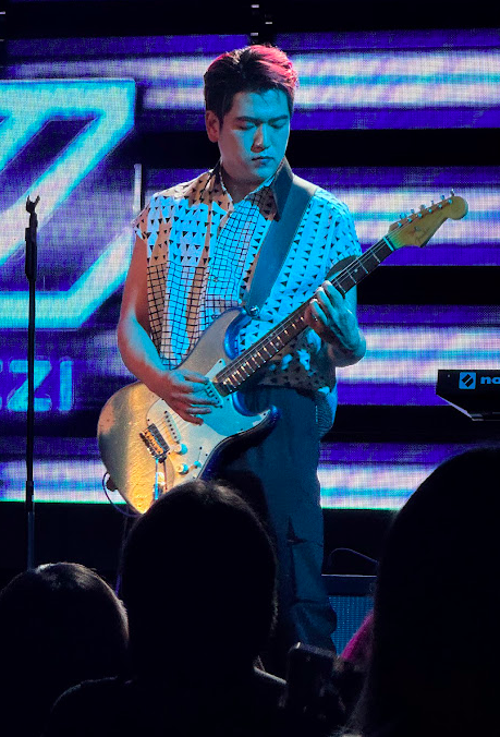 Live guitarist performing music